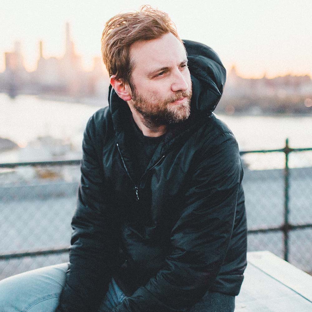 portrait-of-a-man-sitting-at-the-park-BLDFPQS.jpg